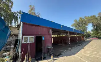 Снос автомойки самообслуживания в Алматы из-за отсутствия разрешений