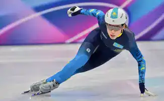 Ольга Тихонова из Казахстана завершает борьбу на Олимпиаде в Италии